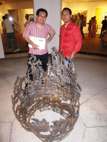 Choy Chun Wei and Abdul Muthalib Musa with the latter’s Pedra Branca 